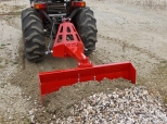 Leveling blades for mini-tractors